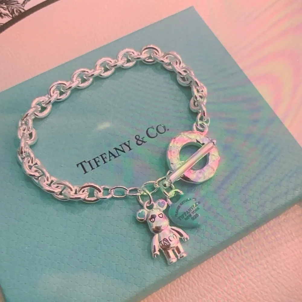 Tiffany & Co. Silver Charm Bracelet with Blue Heart and Bear